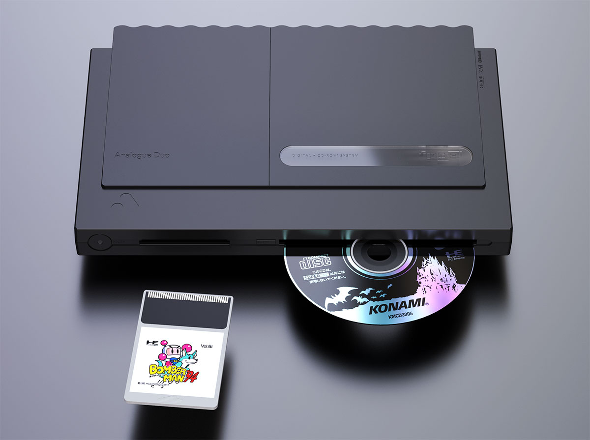 An Analogue Duo console with a CD partially sticking out of the CD slot and a HuCard of Bomberman '94 placed in front of the HuCard slot.